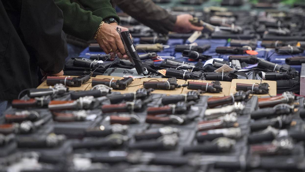 People look at handguns