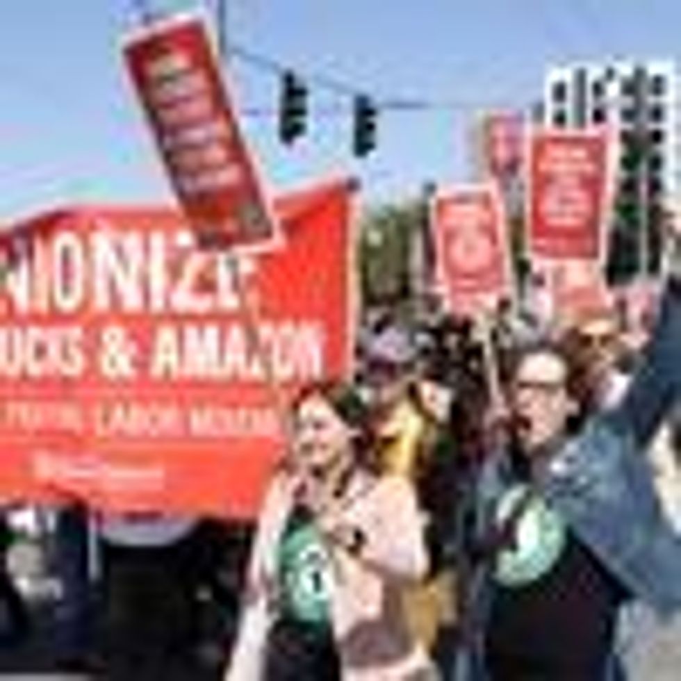 People march during a rally against union-busting