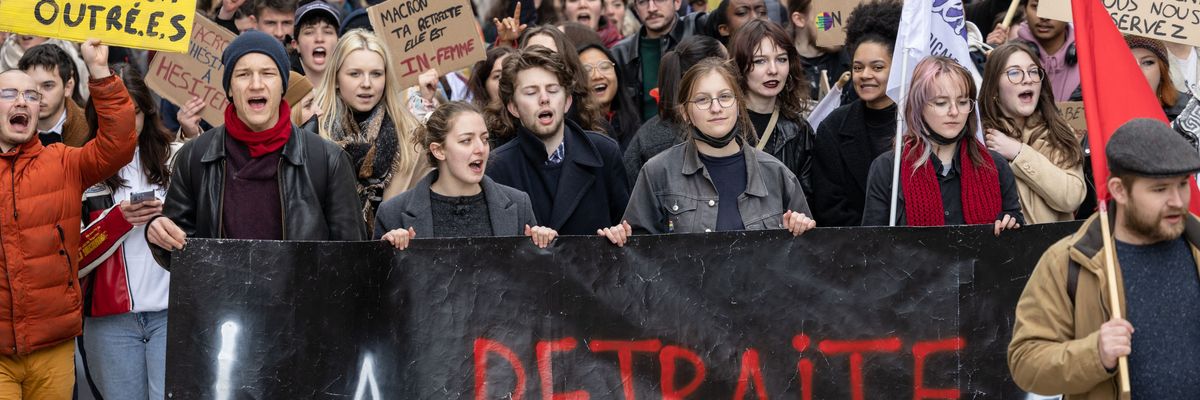 People march in Dijon, France on March 7, 2023.