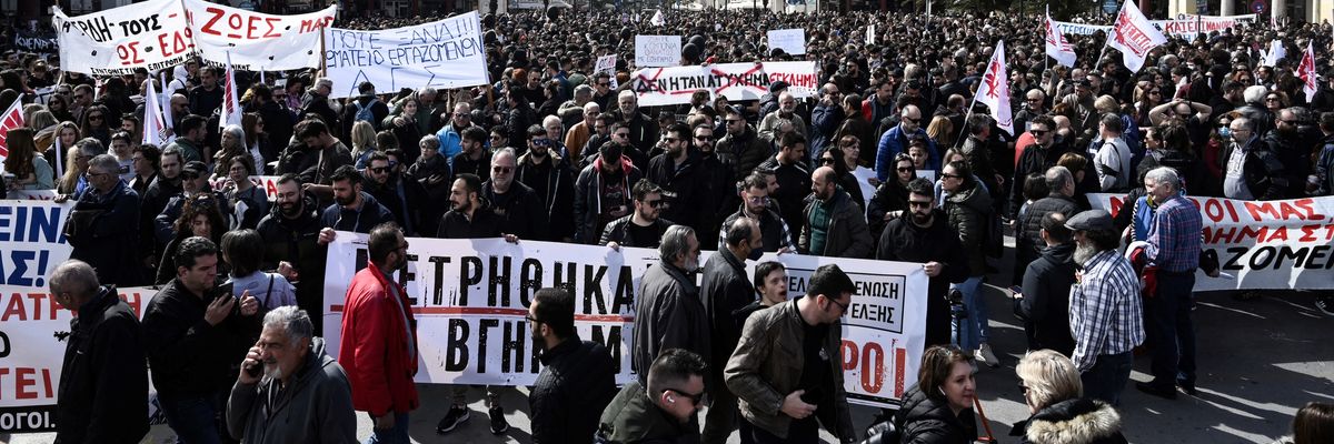 People march in Thessaloniki, Greece on March 8, 2023. 