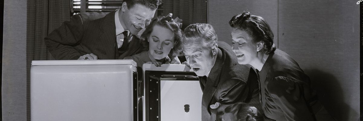 People marvel at a refrigerator