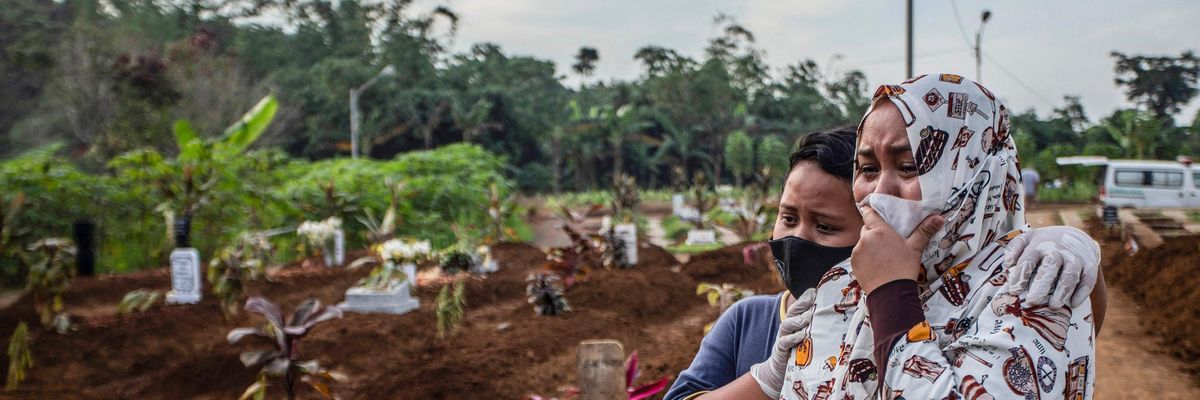 People mourn the death of a family member