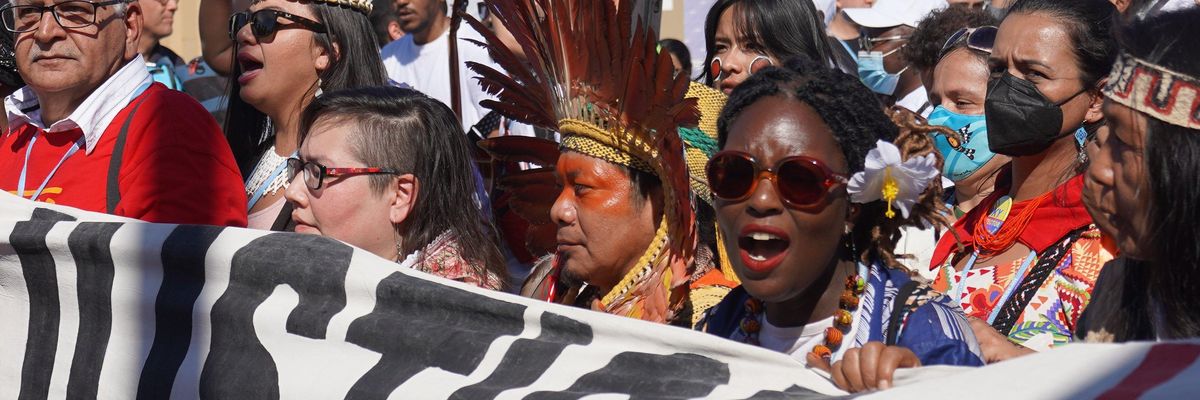 People participate in the Global Day of Action Climate Justice March at COP27 on November 12, 2022 in Sharm El-Sheikh, Egypt.