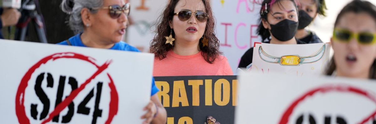 People protest against Senate Bill 4