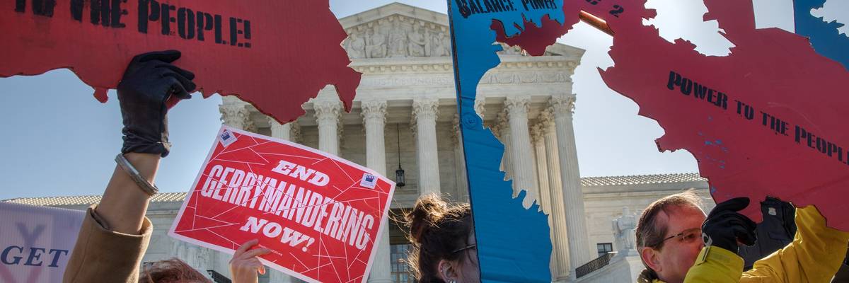 People protest gerrymandering outside the Supreme Court.
