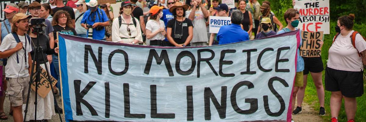 People protest ICE killing in Maine.