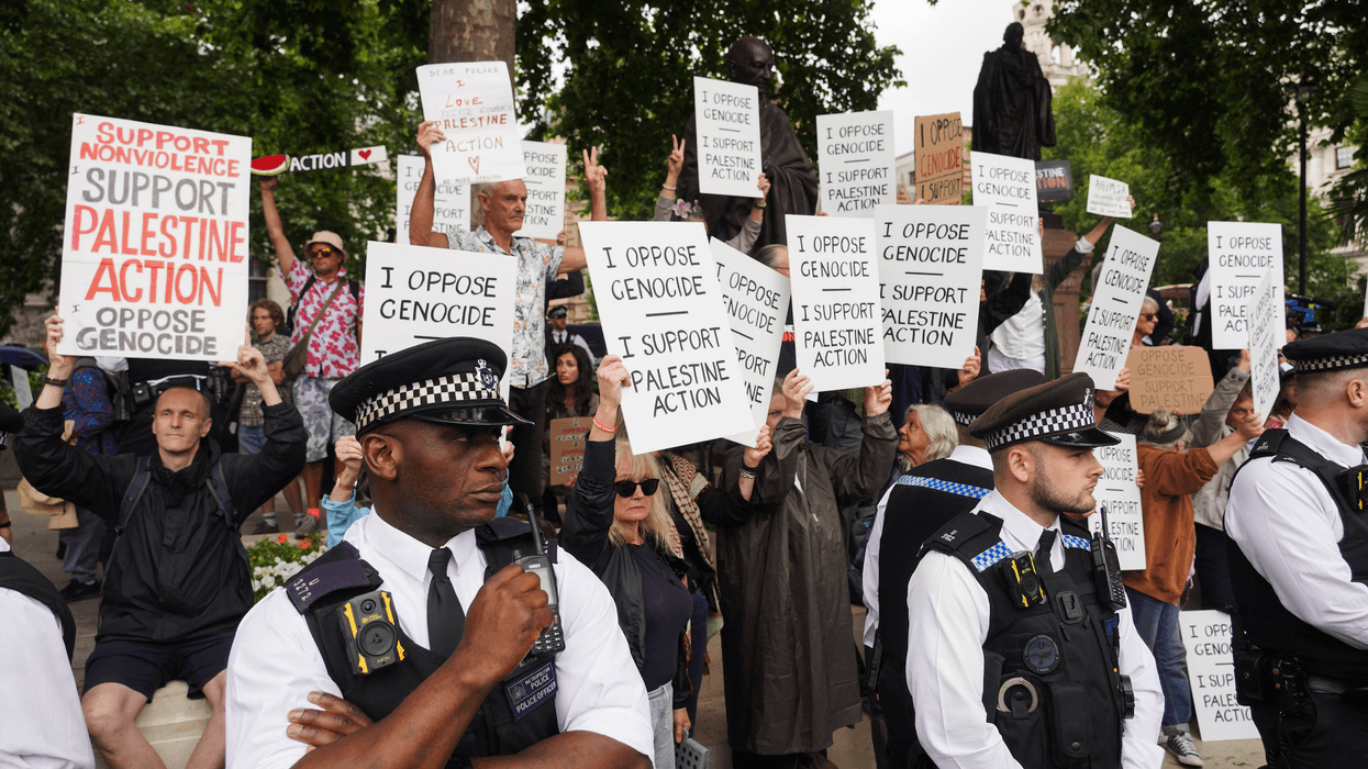 People protest in London for Palestine Action as cops look on