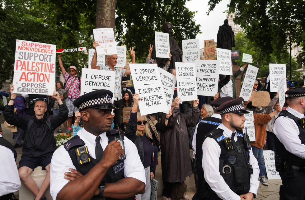 People protest in London for Palestine Action as cops look on