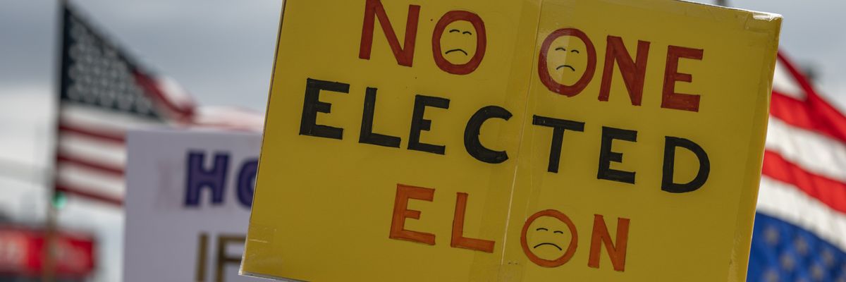 People protest outside the former SpaceX headquarters