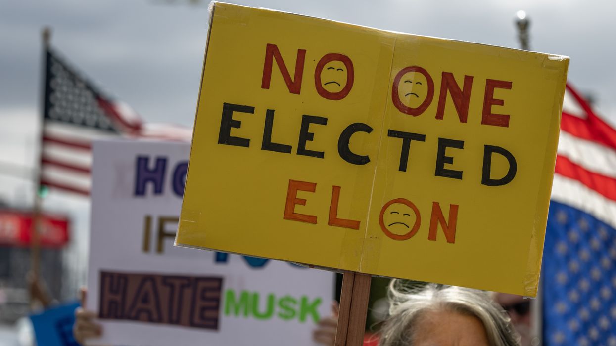 People protest outside the former SpaceX headquarters