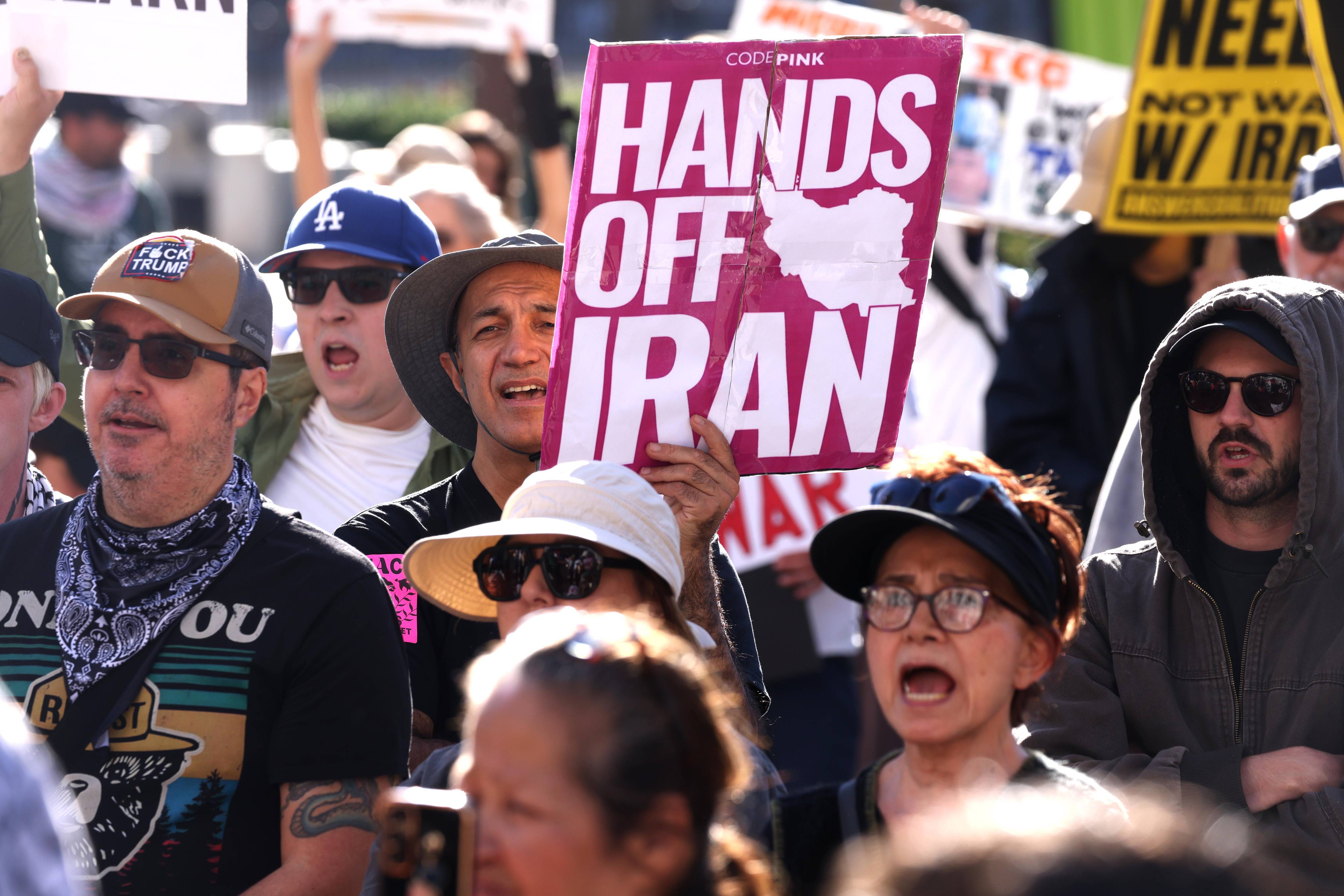 People protest the Iran War.