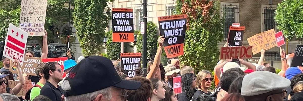 People protest Trump's DC takeover.