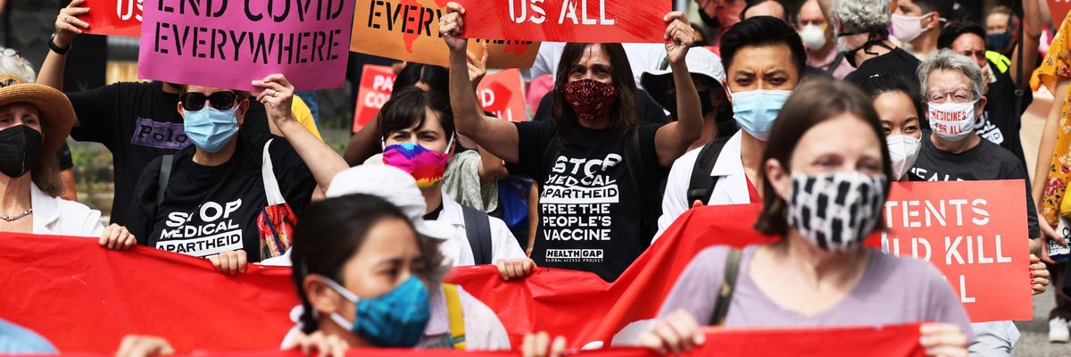 People protest vaccine inequity near Pfizer's headquarters