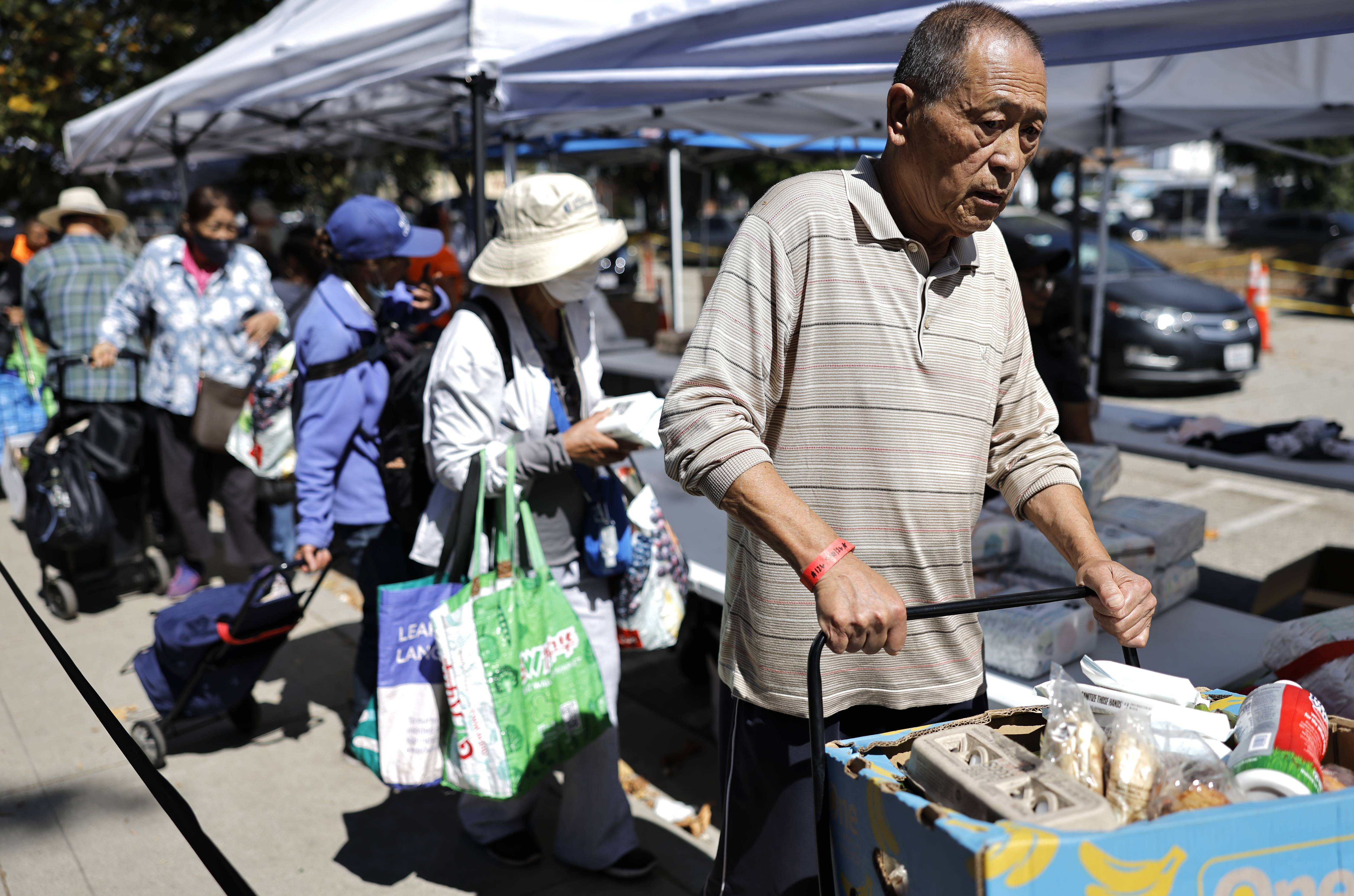 People queue at a California food pantry