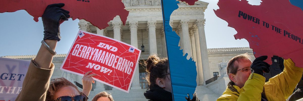 People rally against gerrymandering in front of the U.S. Supreme Court on March 26, 2019.