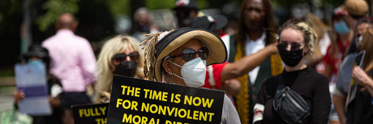 People rally demanding passage of the For the People Act