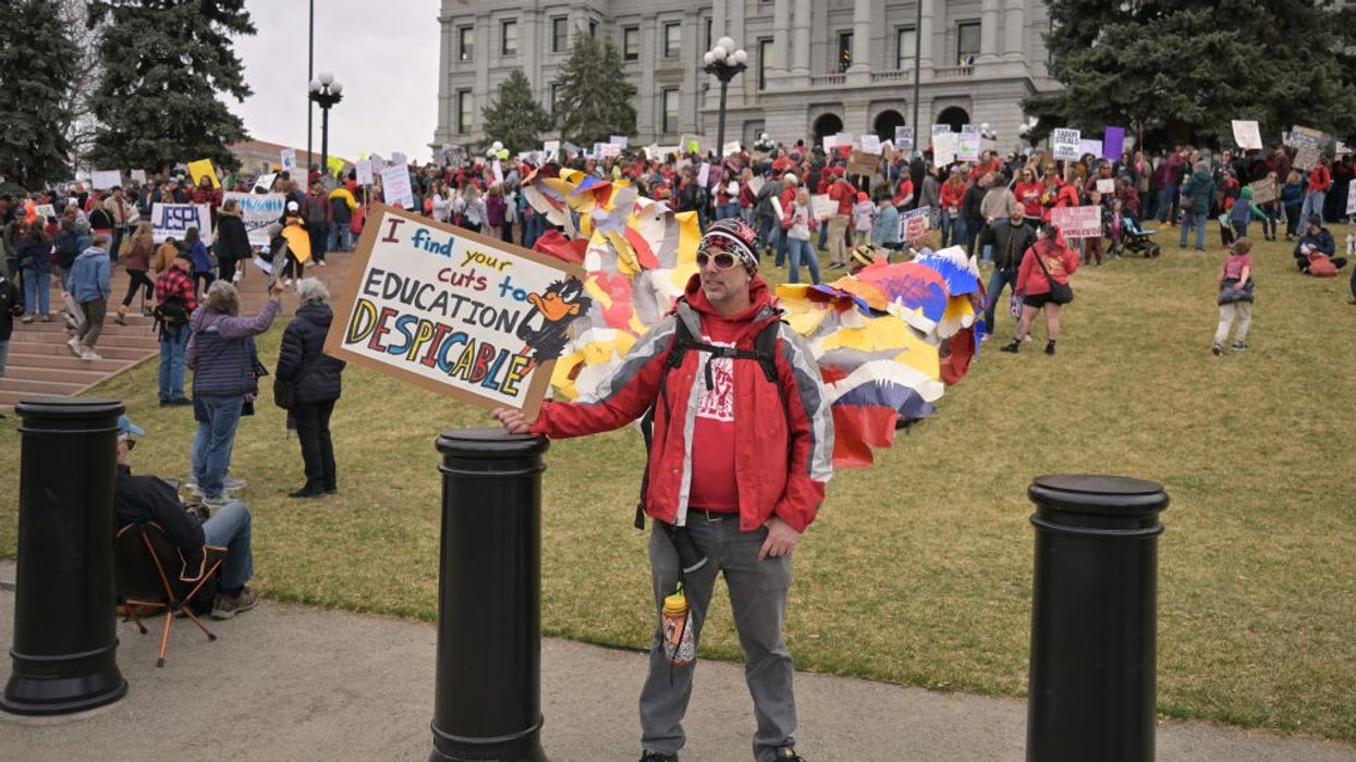 People rally for the fully funded public schools outside the Colorado State Capitol