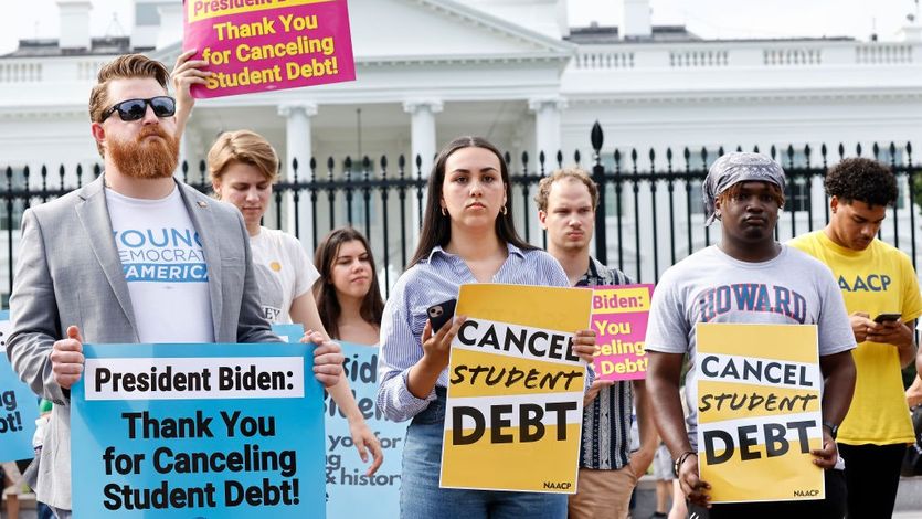 People rally in support of President Joe Biden's student debt cancellation plan on August 25, 2022 in Washington, D.C.