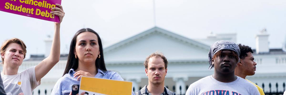 People rally in support of President Joe Biden's student debt cancellation plan on August 25, 2022 in Washington, D.C.