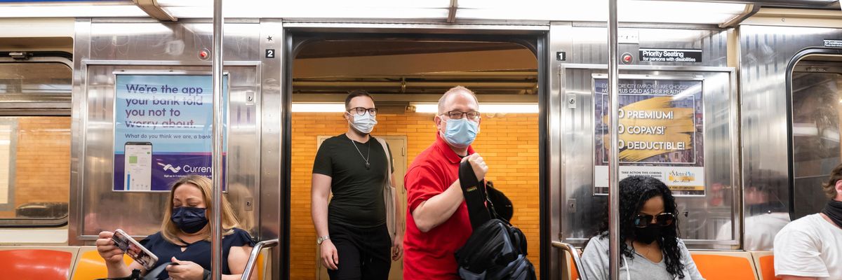 People ride the New York City subway on May 26, 2021.