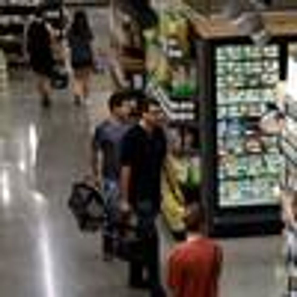 People shop at a local supermarket in Washington, D.C. on September 13, 2022.