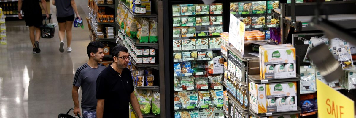 People shop at a local supermarket in Washington, D.C. on September 13, 2022.