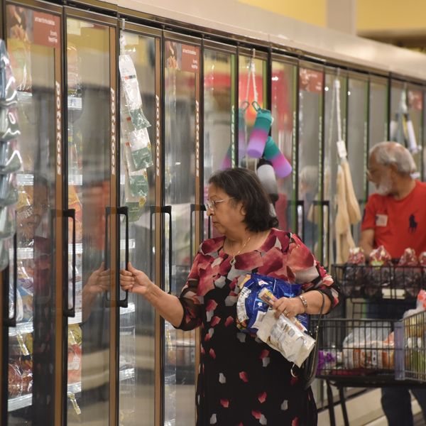 People shop at a supermarket