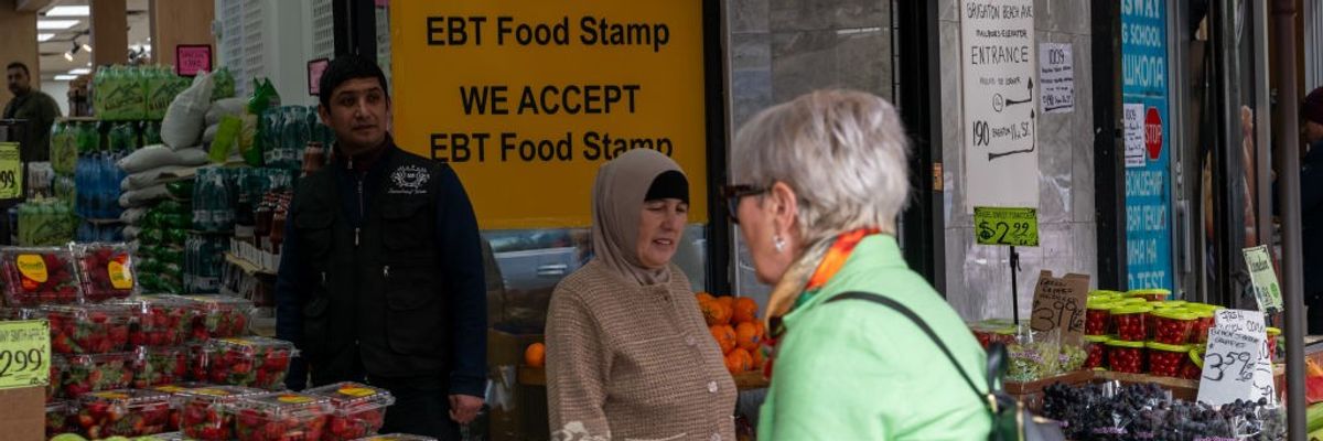 People shop for food in Brooklyn