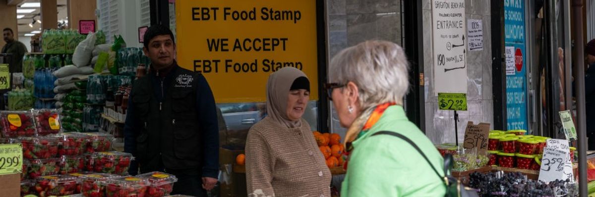 People shop for food in Brooklyn
