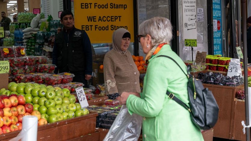 People shop for food in Brooklyn