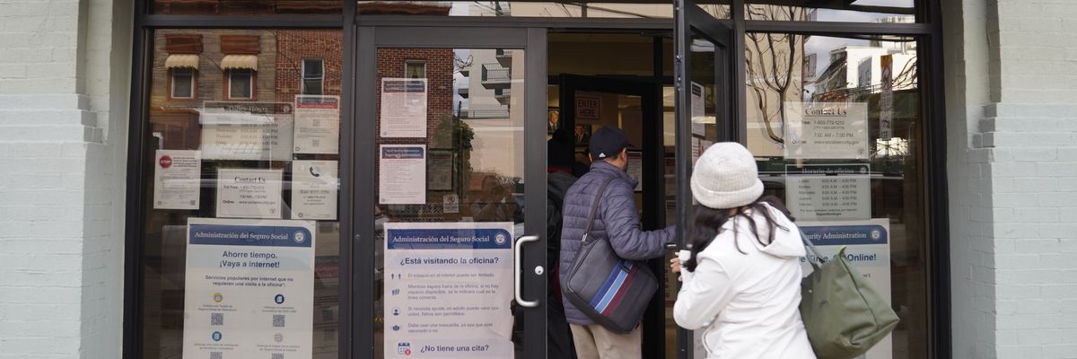 People step into an office of the Social Security Administration