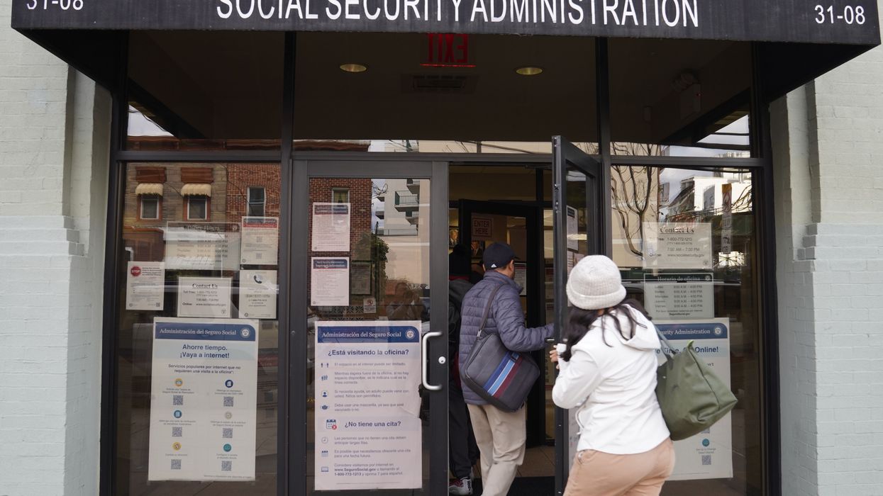 People step into an office of the Social Security Administration