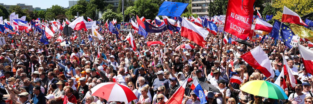People take part in a march against Poland's right-wing government in Warsaw