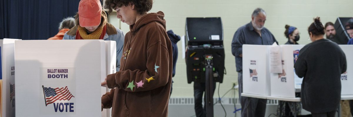 People vote at a polling location at Indianola Church of Christ