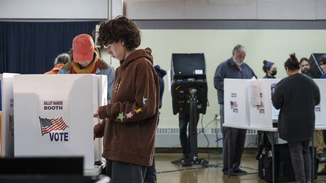 People vote at a polling location at Indianola Church of Christ
