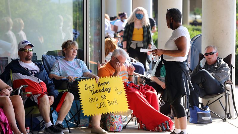 People Wait In Line To File For Unemployment Benefits In Frankfort, Kentucky