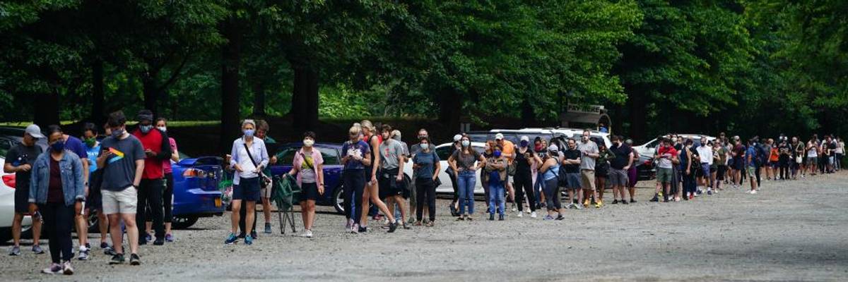 'This Is by Design': Georgia Election Disaster Condemned as Result of Deliberate GOP Voter Suppression