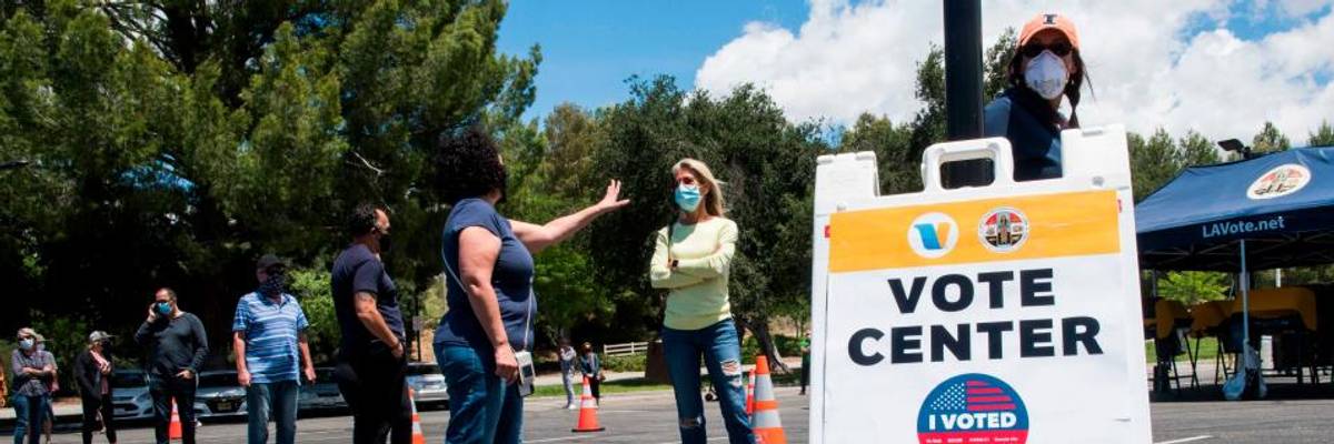 "He Doesn't Want You to Vote": Trump Threatens to Block Funding to Michigan for Sending Absentee Ballot Forms to All Voters Amid Covid-19