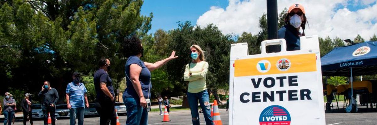 "He Doesn't Want You to Vote": Trump Threatens to Block Funding to Michigan for Sending Absentee Ballot Forms to All Voters Amid Covid-19