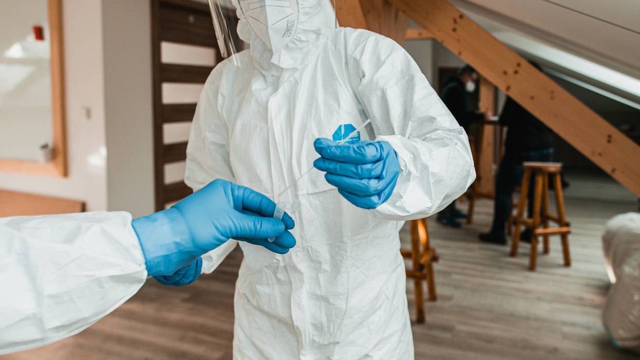 Person in bio hazard suit.
