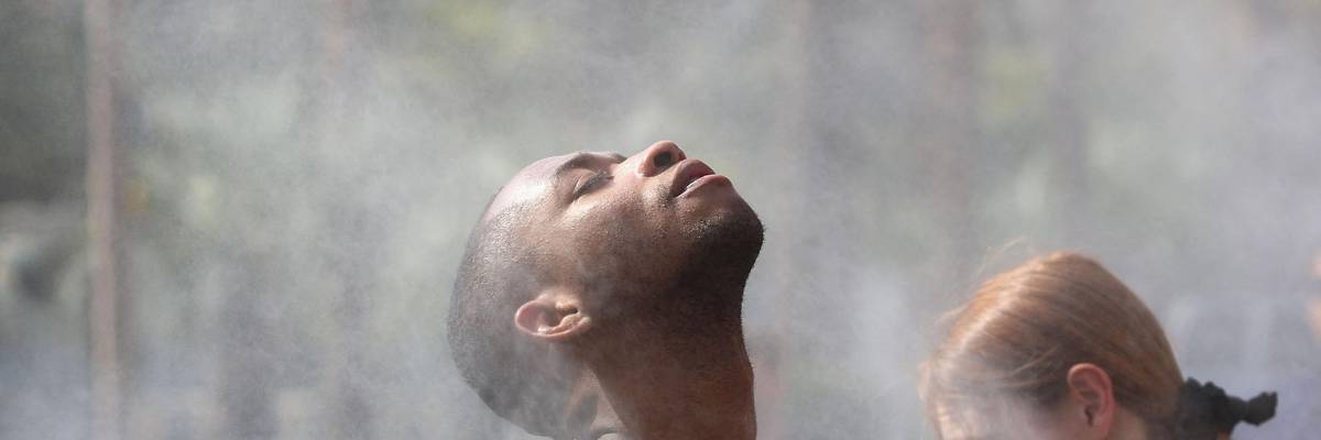 person in water mister