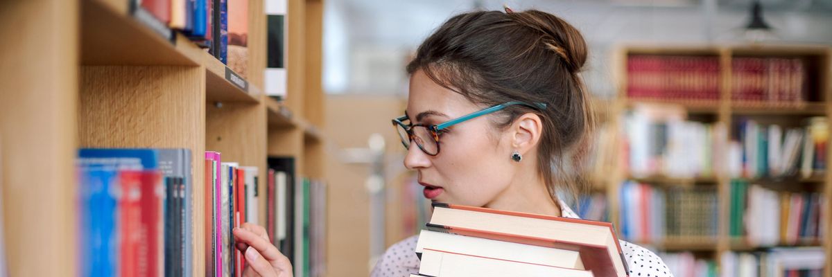 Person looking at books