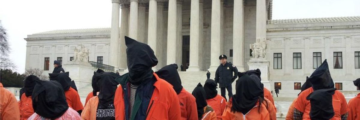 Dept. of Justice: Corporations Are People... Gitmo Prisoners Are Not