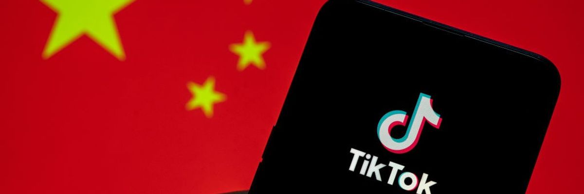 Photo illustration of Chinese flag and TikTok logo