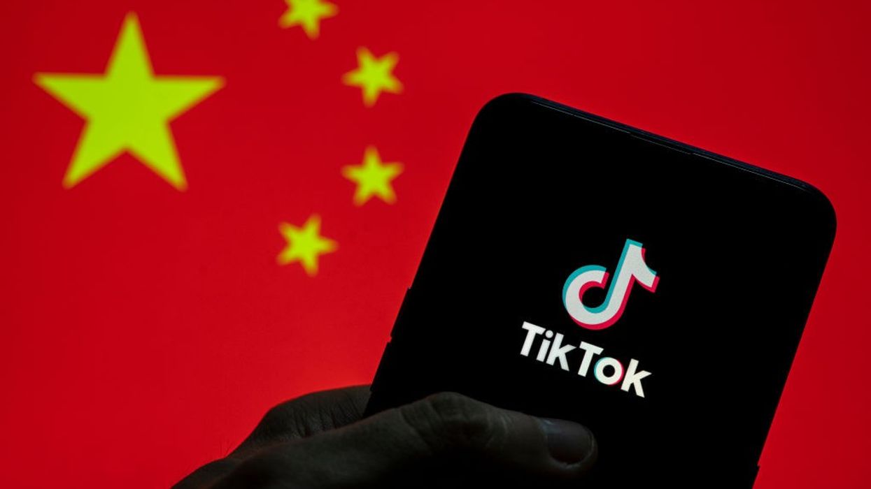 Photo illustration of Chinese flag and TikTok logo