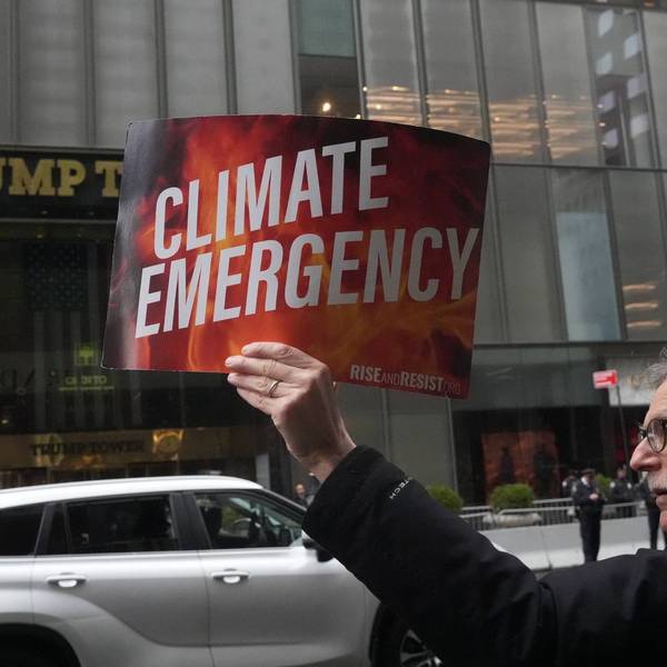 Police arrest activists who block traffic on 5th Ave during the Earth Day Protest outside Trump Tower