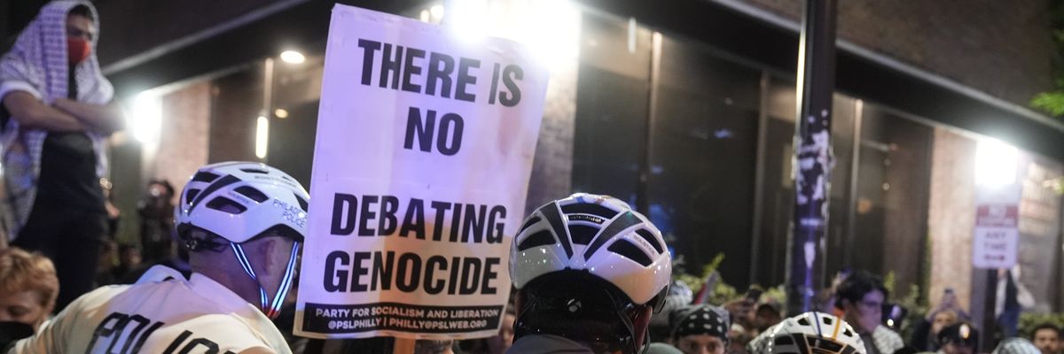 Police arrest pro-Palestine demonstrators outside debate.