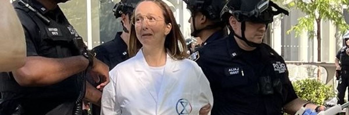 police arresting a protester at Citigroup