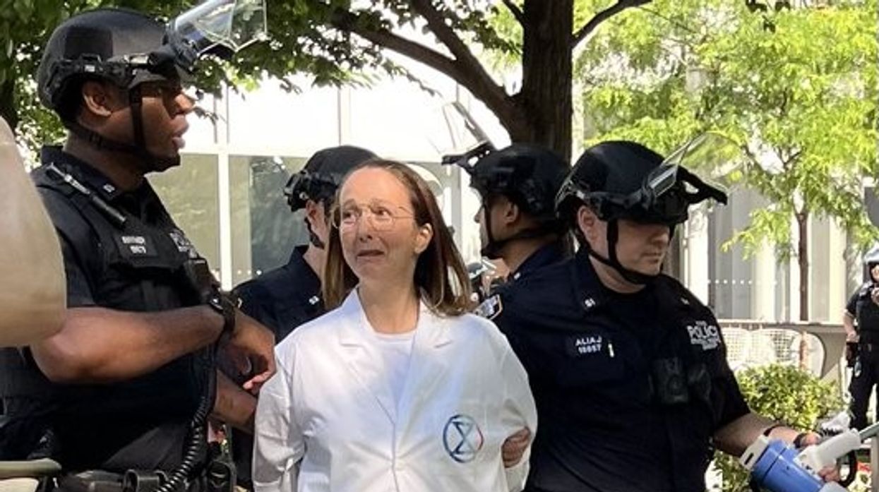 police arresting a protester at Citigroup