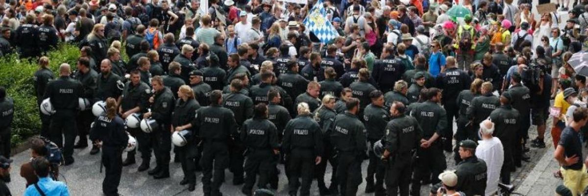 20,000+ Police March In Force Against G7 Protests in Germany